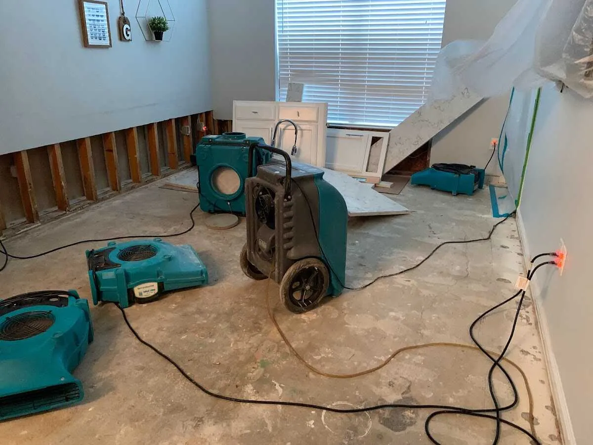 Dehumidifier in flood-cut room for Water Damage Restoration in Bath
